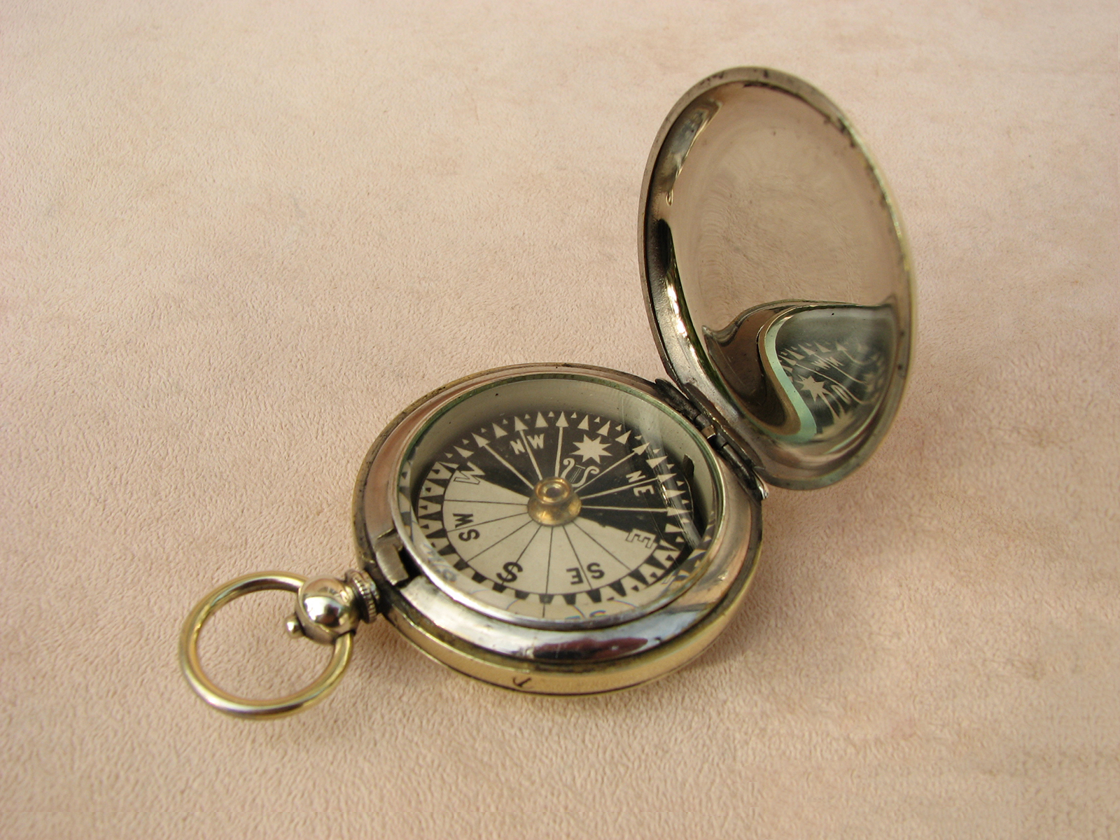 WW1 era pocket compass with Singers patent style dial